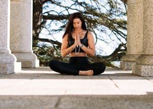 A client practicing mindfulness meditation to manage anxiety and stress.